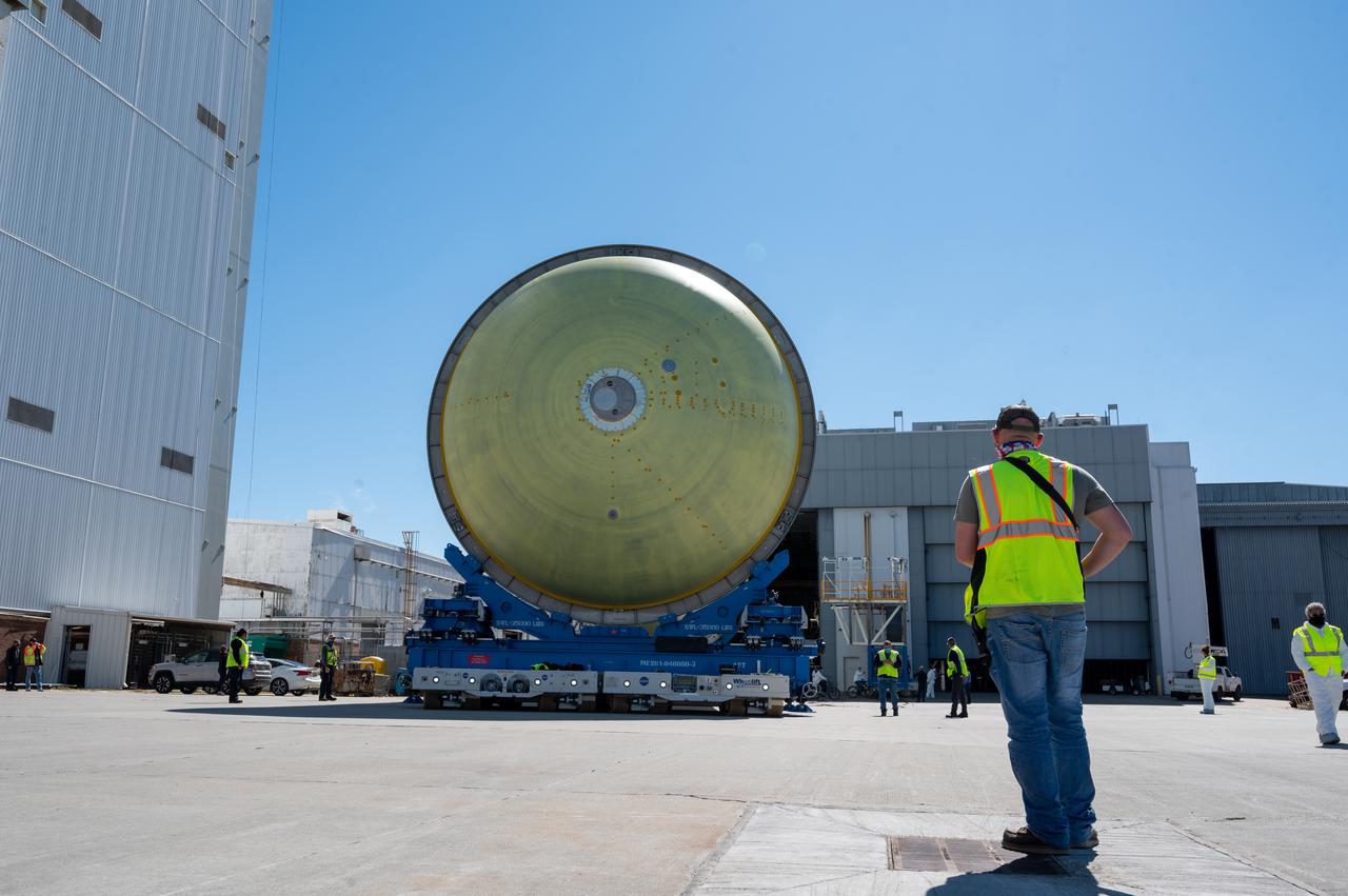This image highlights the liquid hydrogen tank that will be used on the core stage of NASA’s Space Launch System rocket for Artemis II, the first crewed mission of NASA’s Artemis program. The tank is being built at NASA’s Michoud Assembly Facility in New Orleans. The SLS core stage is made up of five unique elements: the forward skirt, liquid oxygen tank, intertank, liquid hydrogen tank, and the engine section. The liquid hydrogen tank holds 537,000 gallons of liquid hydrogen cooled to minus 423 degrees Fahrenheit and sits between the core stage’s intertank and engine section. The liquid hydrogen hardware, along with the liquid oxygen tank, will provide propellant to the four RS-25 engines at the bottom of the cores stage to produce more than two million pounds of thrust to launch NASA’s Artemis missions to the Moon. Together with its four RS-25 engines, the rocket’s massive 212-foot-tall core stage — the largest stage NASA has ever built — and its twin solid rocket boosters will produce 8.8 million pounds of thrust to send NASA’s Orion spacecraft, astronauts and supplies beyond Earth’s orbit to the Moon and, ultimately, Mars. Offering more payload mass, volume capability and energy to speed missions through space, the SLS rocket, along with NASA’s Gateway in lunar orbit, the human landing system, and Orion spacecraft, is part of NASA’s backbone for deep space exploration and the Artemis lunar program. No other rocket can send astronauts in Orion around the Moon in a single mission.